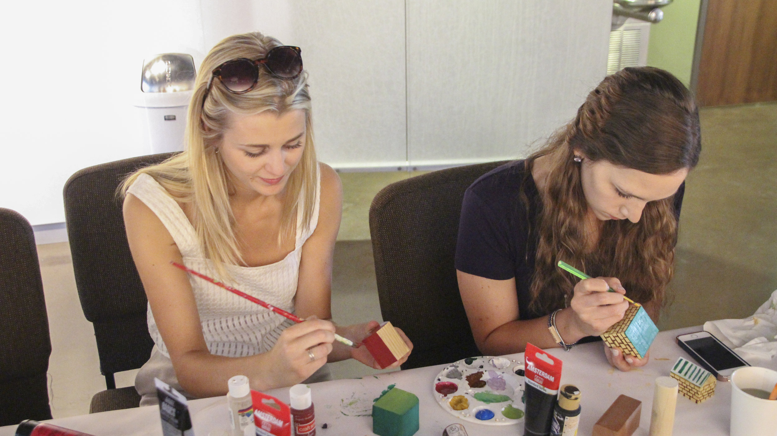 Participants were able to have a hand in visually representing their community, choosing a block shape and painting windows and doors, patterns and textures on it.