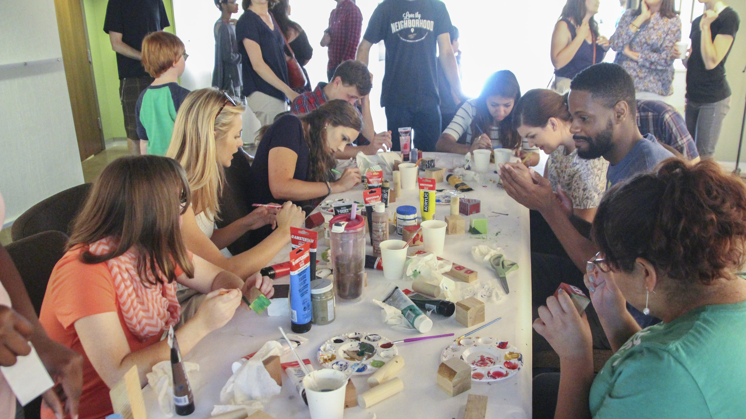 We kicked off part three of the project at the reception and artist talk for the exhibit In Seeking Home by painting the blocks.