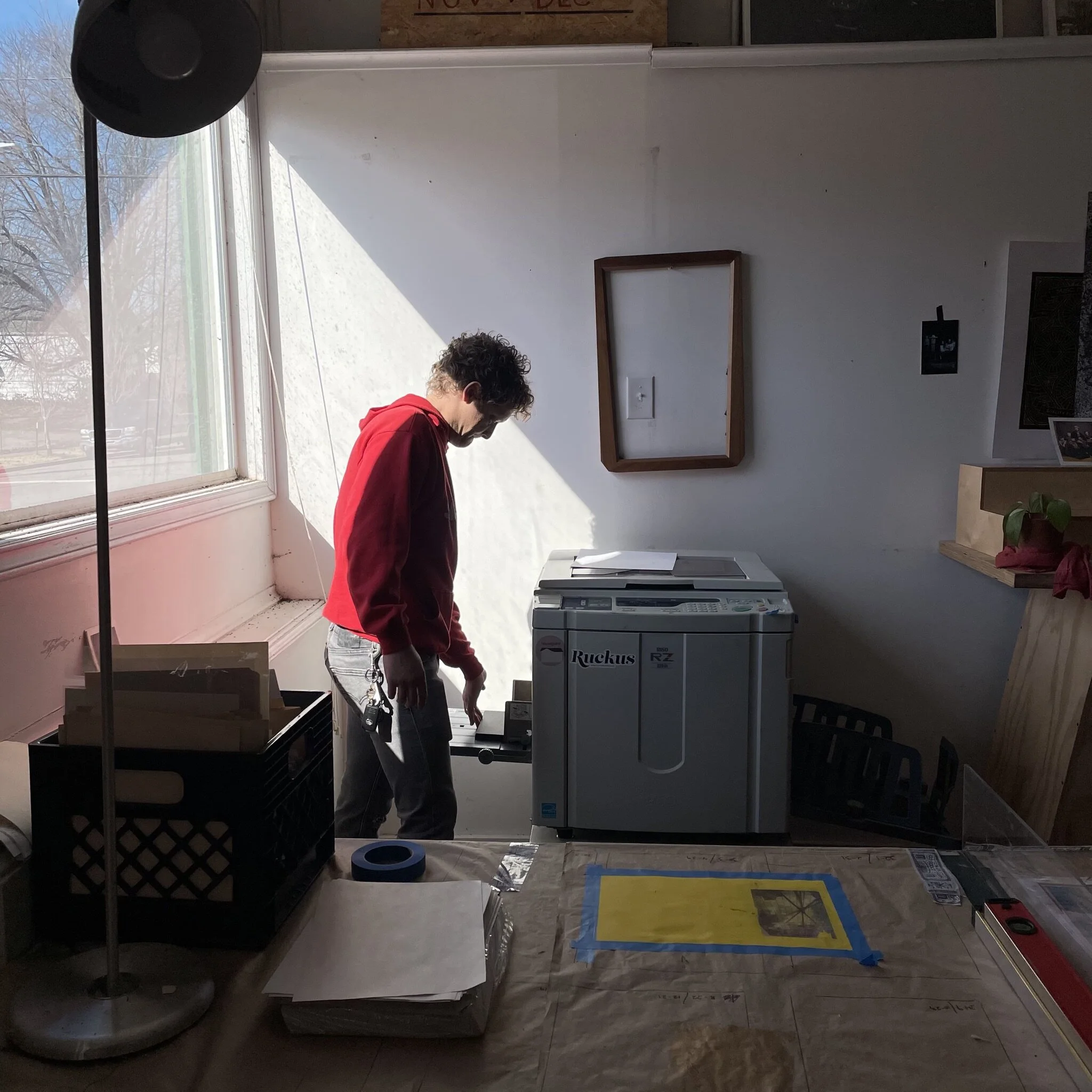 Tim Robertson working with his risograph.