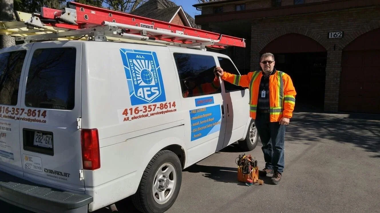licensed-electrician-near-company-van.jpg