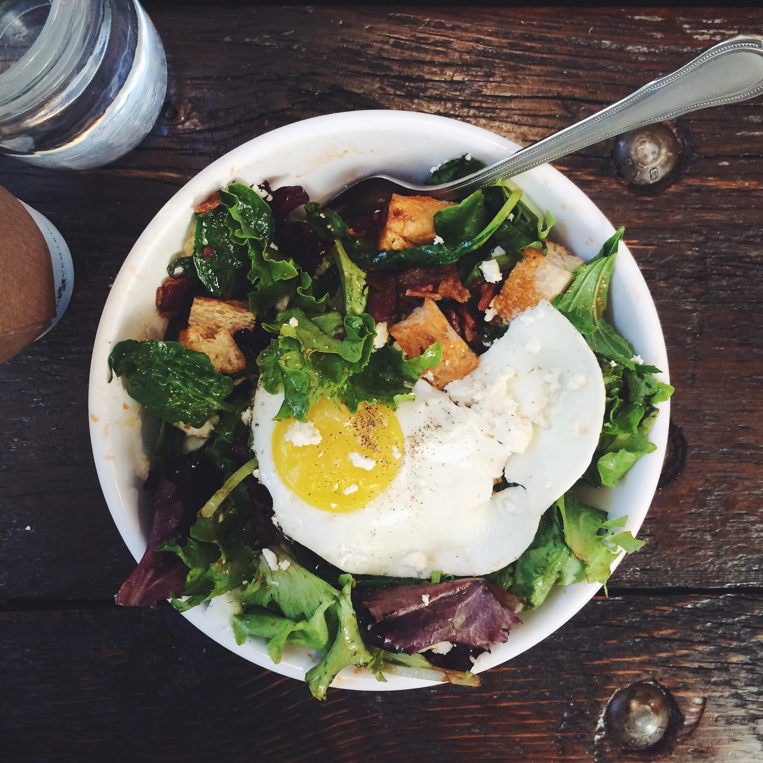 Panzanella: house made bread topped with kale, bacon, feta, sun-dried tomato vinaigrette, egg. In other words ... salad for breakfast! So simple ... why have I never done this? Mental note: eat salad for breakfast more often.