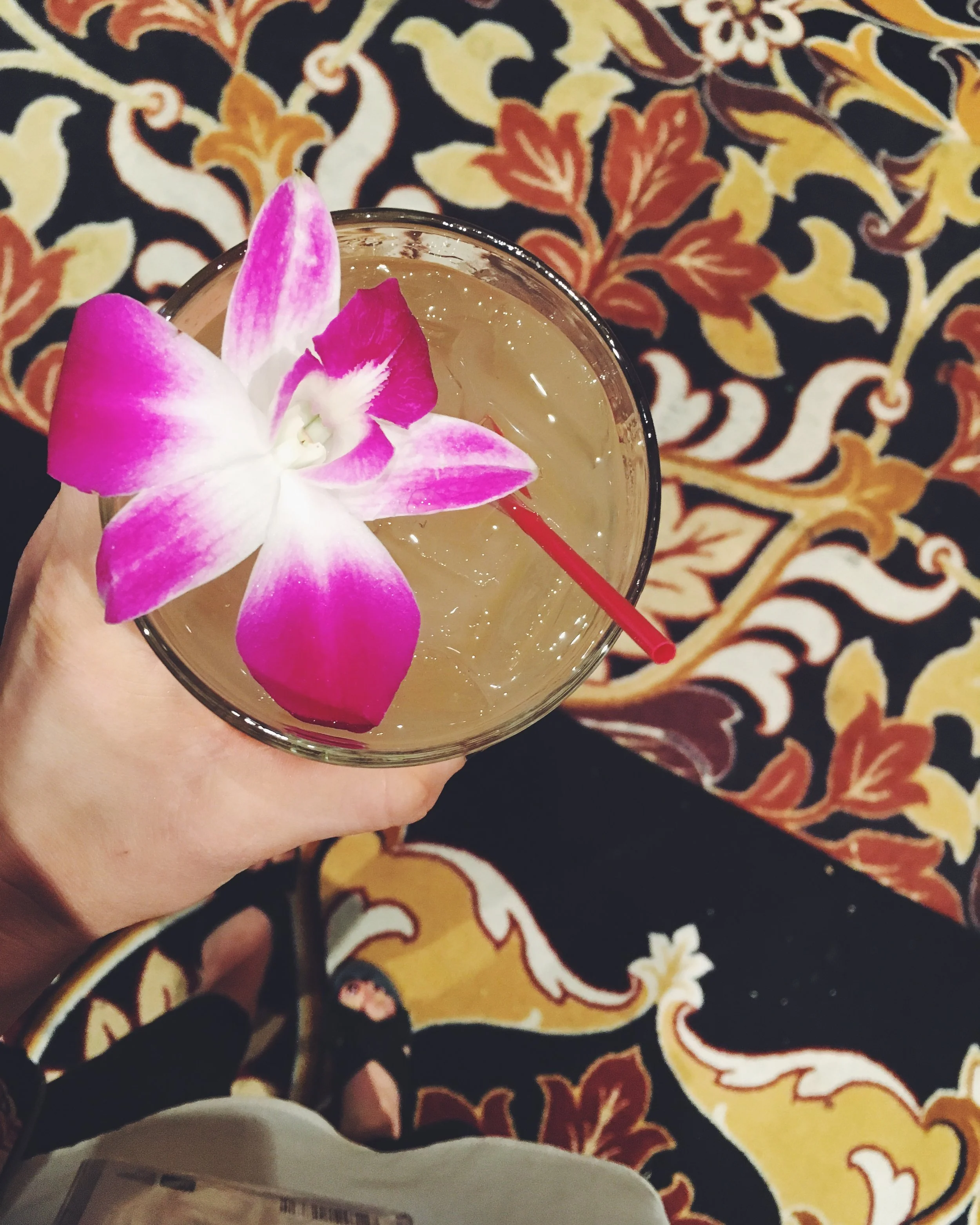 Floral drink, floral carpet.