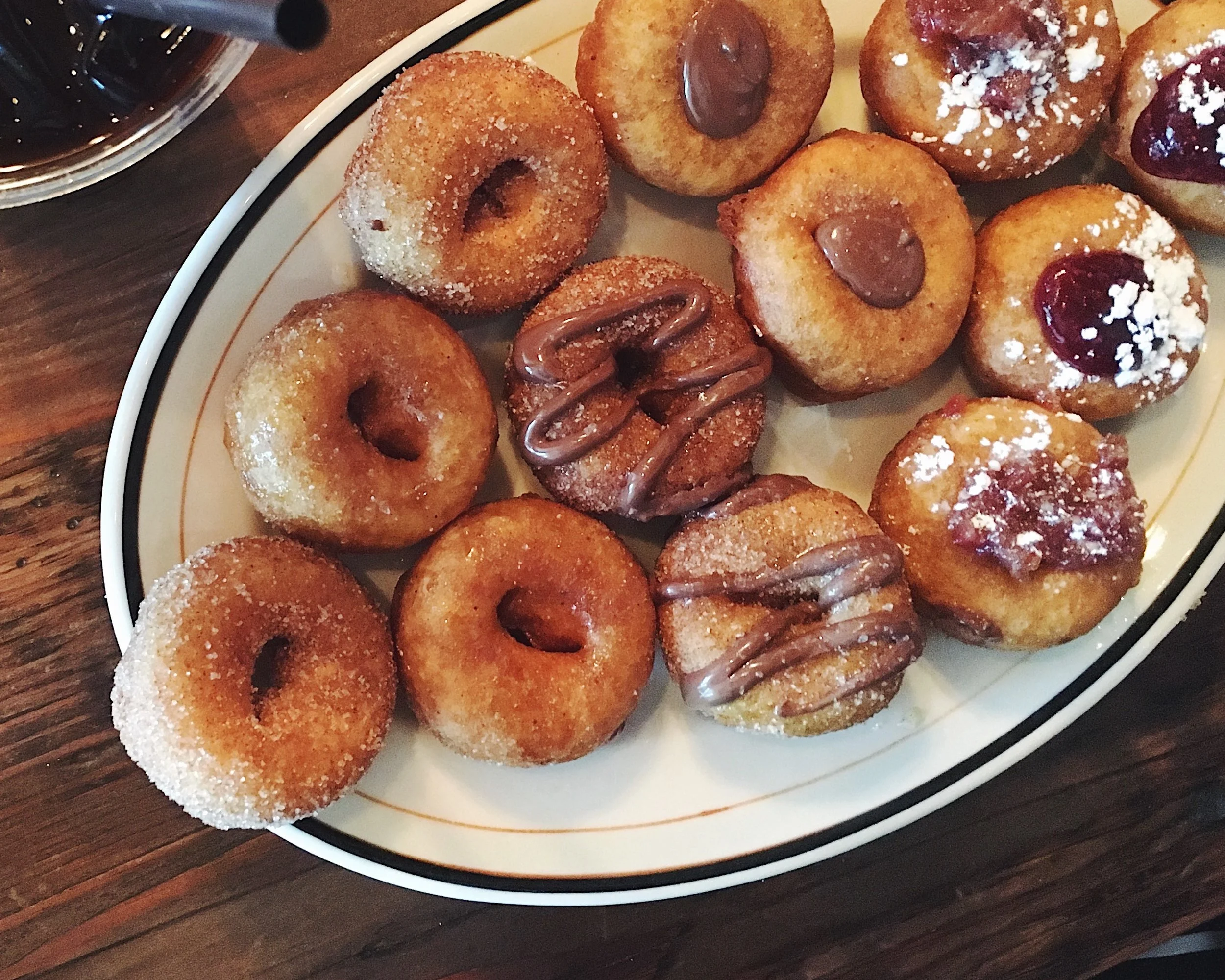 When Pips offers you a free dozen on your last day in Portland because you bought from Blue Star the previous week on National Donut Day ... take advantage. #communitynotcompetition "Two of each flavour, please."