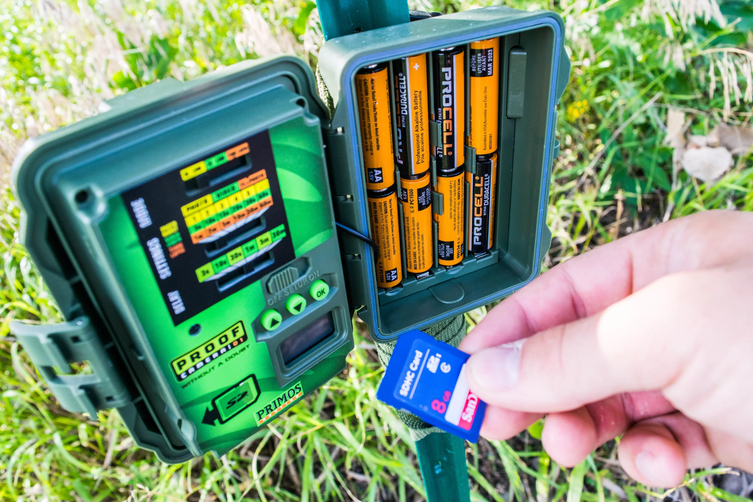 checking-trail-camera