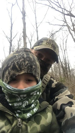 Adam and his son this past fall. 