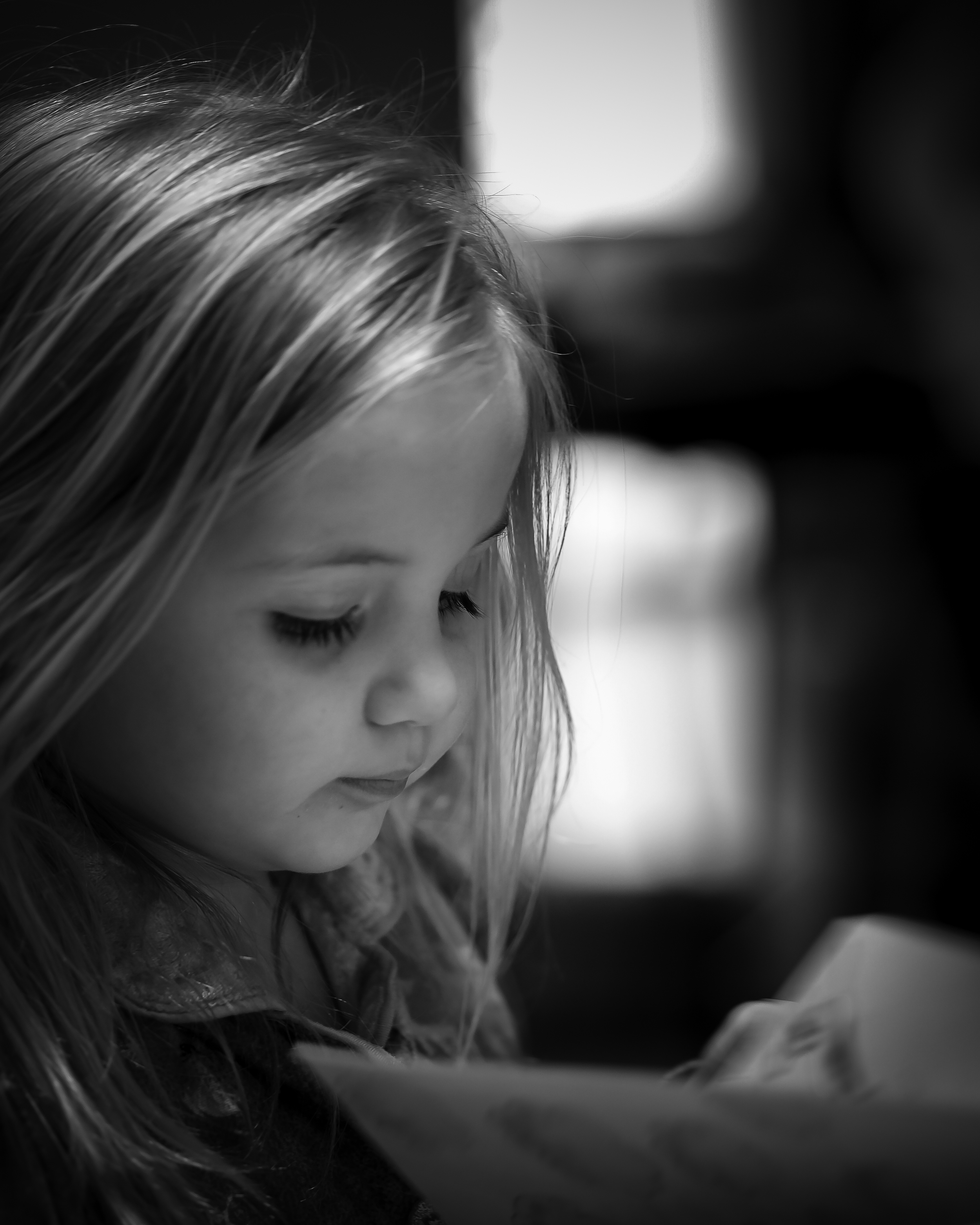 Ellie reading B&W-1.jpg