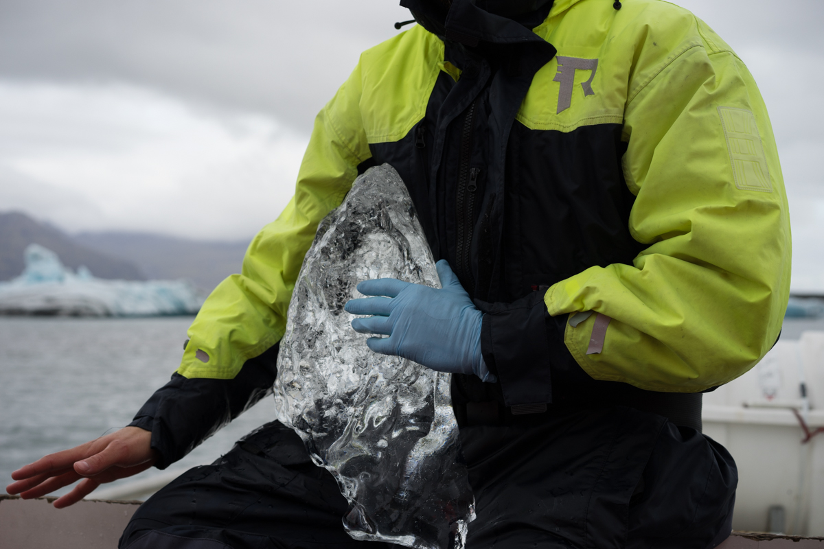 The glacier guide about to hack off a piece of glacier ice for us to eat. Yummy.
