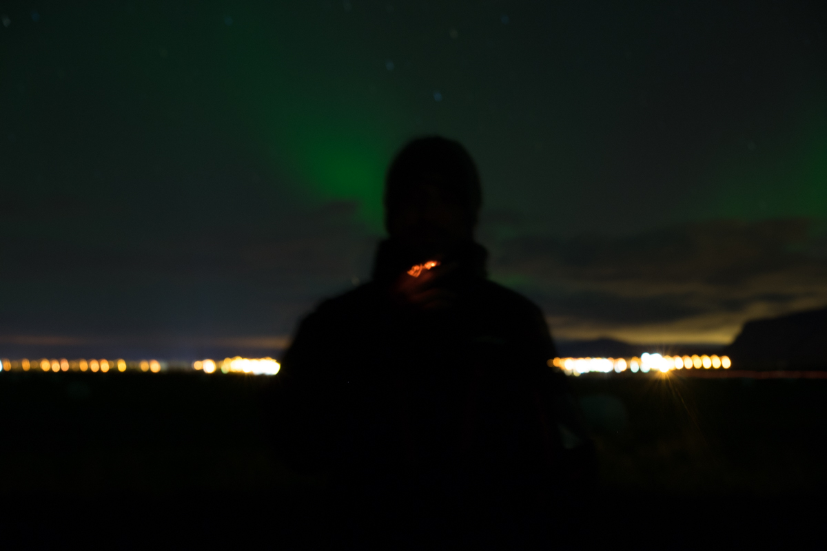 The aurora borealis turns cigarette smoke green... just kidding.