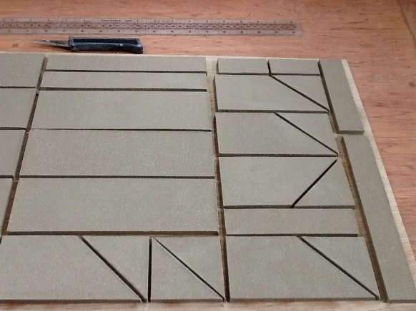 And of course if you are making for a specific scheme the tiles can be pre-made to size and shape, thus avoiding costly and wasteful cutting of fired tiles.... easy!
