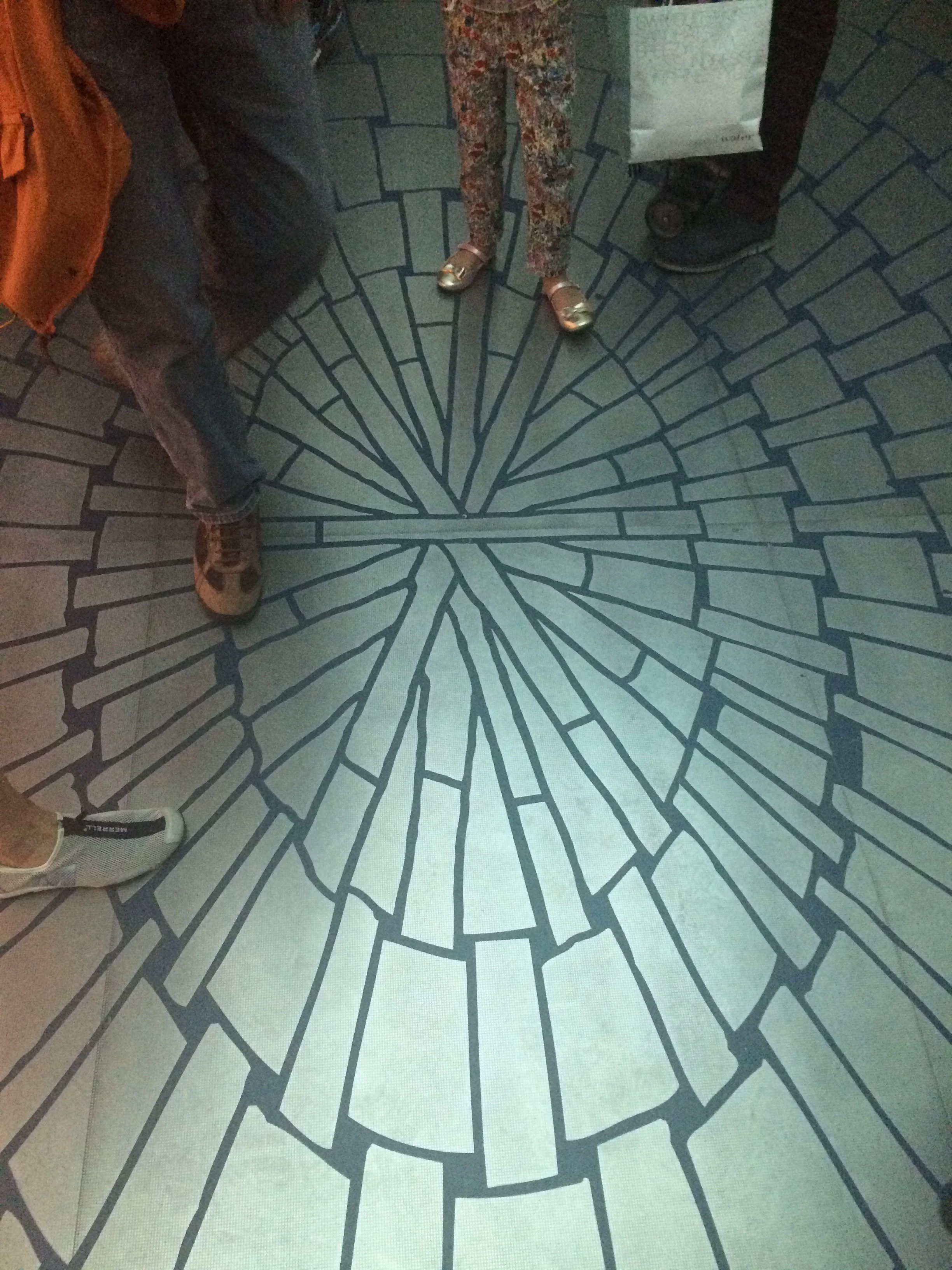 The floor of one of the elevators from "Six in Four": Etched Steel Panels create the inside of a Wicker basket.