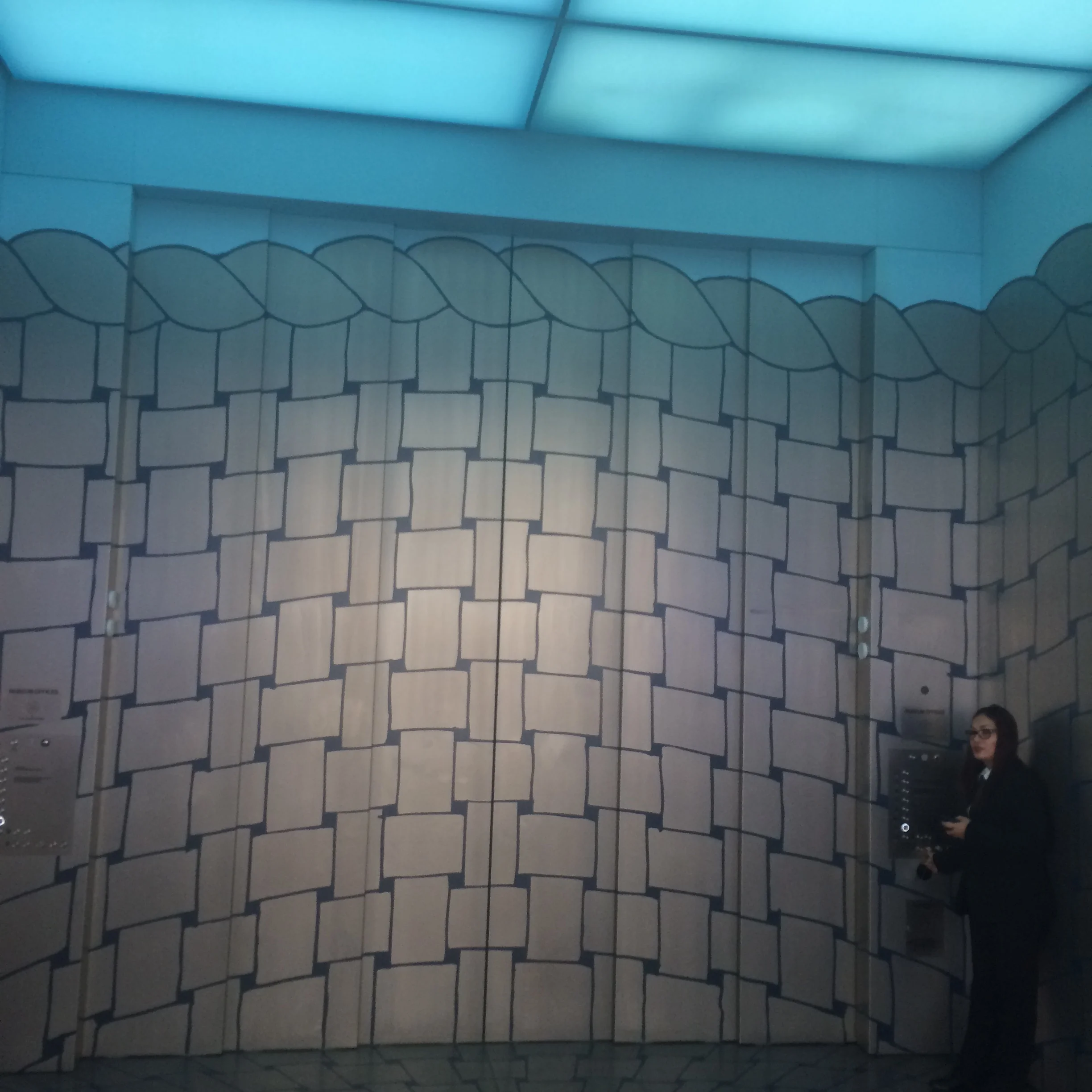 Looking into the large art elevator from the Lobby of the Whitney Museum.