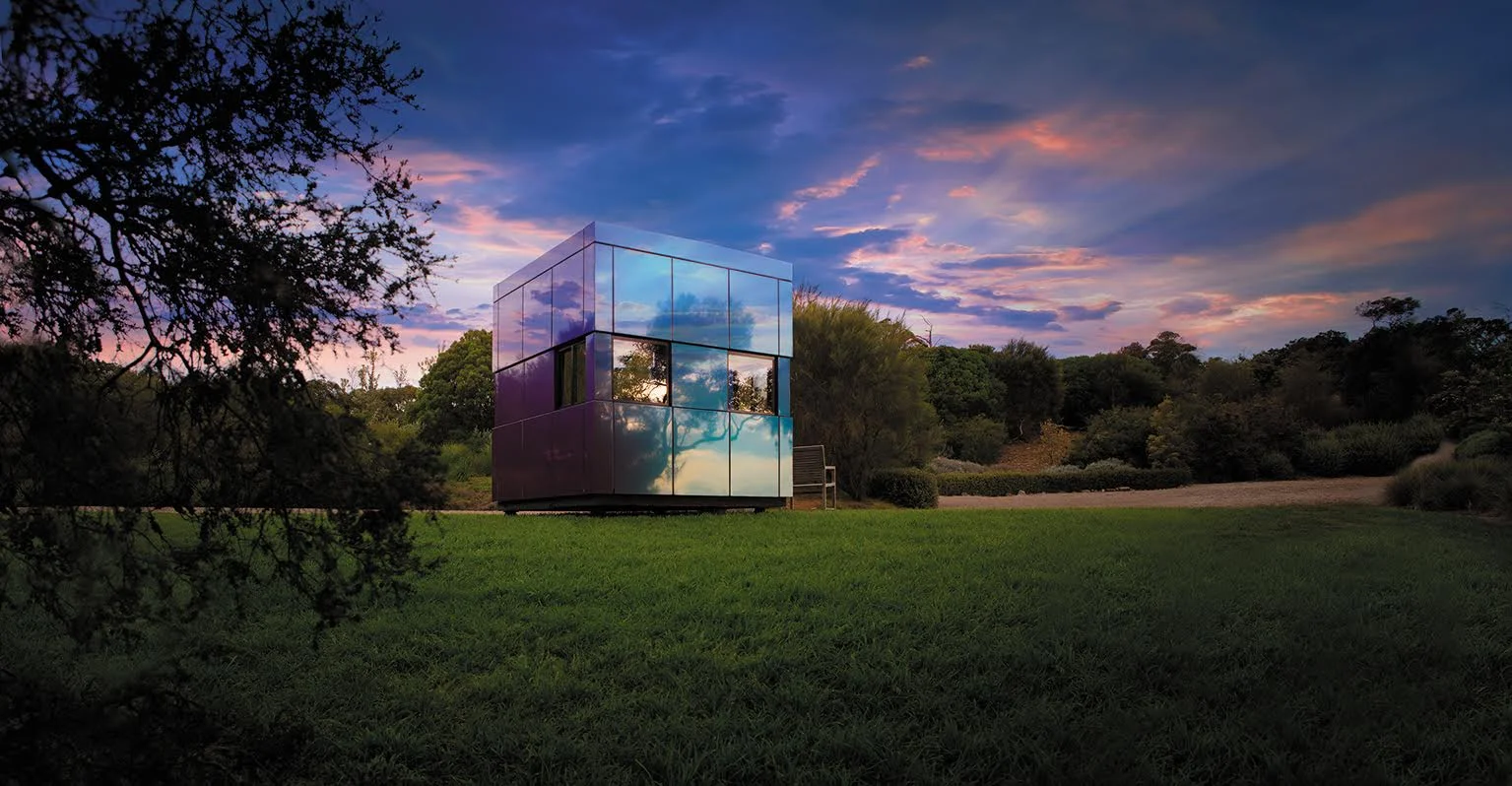 Harwyn Pods, clad in Spectra colors of Alucobond reflecting the trees and sky. Source:Harwyn