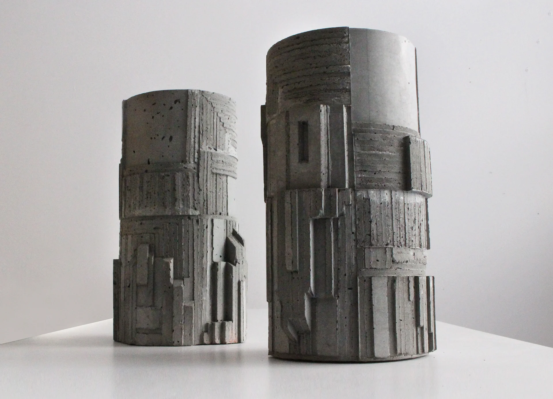 Brutalist Concrete Vase No.1- by David Umemoto. Observe the detailed molding and delicate forms on the vases- which are only 12" high.