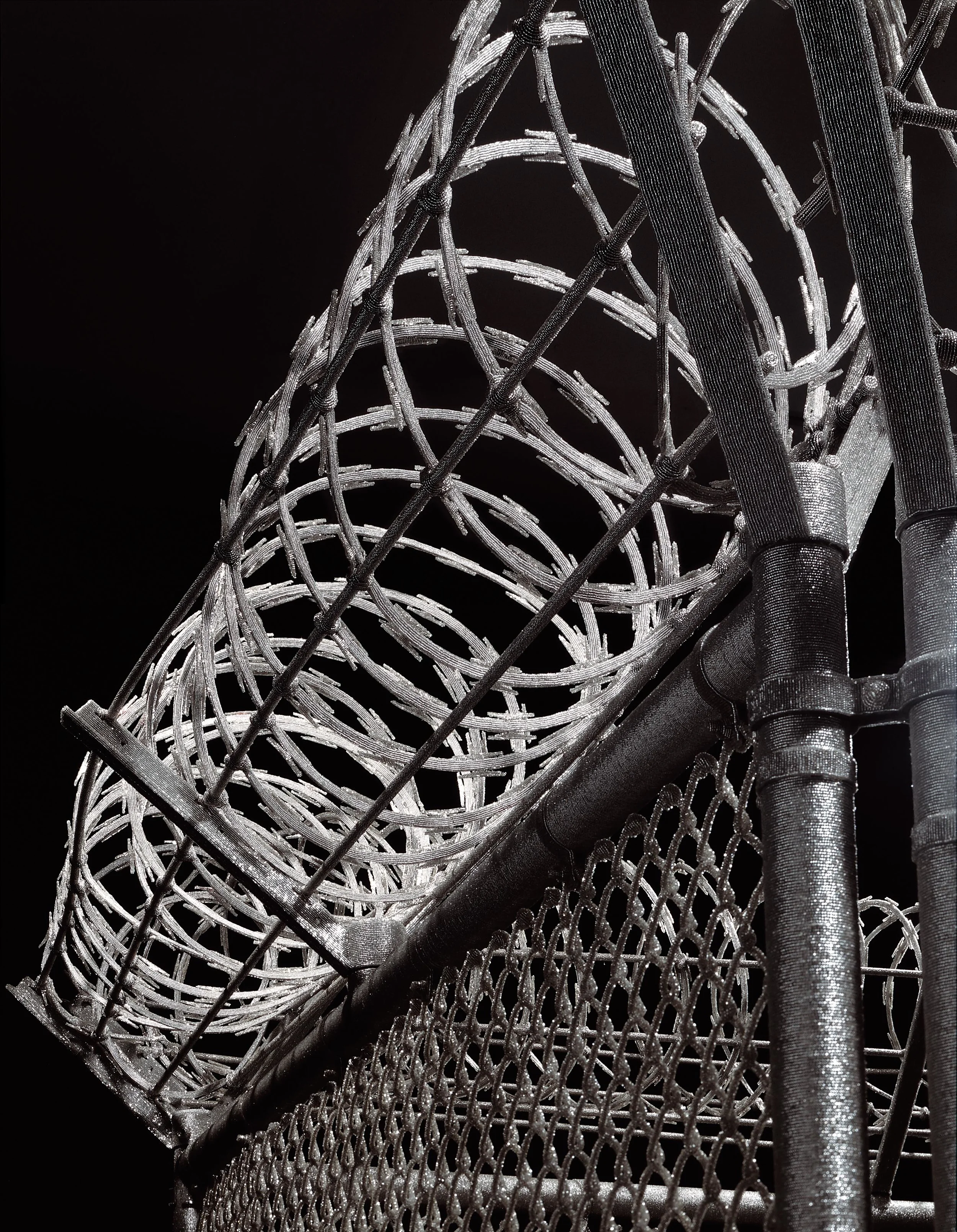 Security Fence, 2005-by Liza Lou, Clad in silver glass beads.