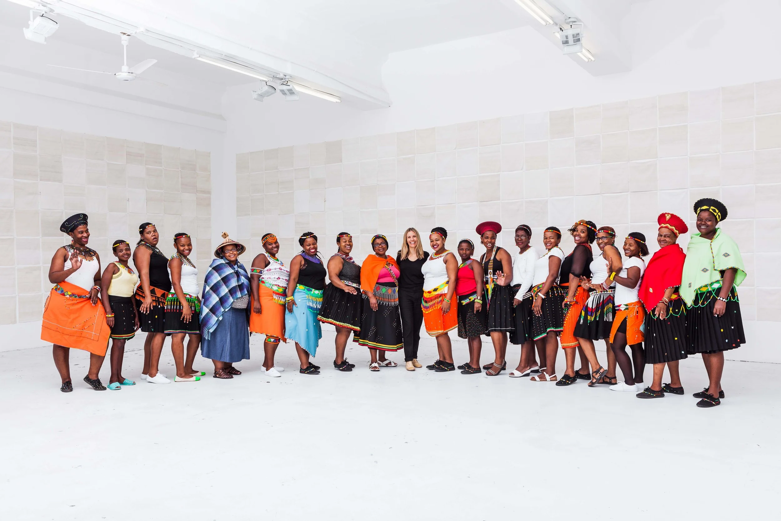 Liza, with the her women of her studio, in Durban.