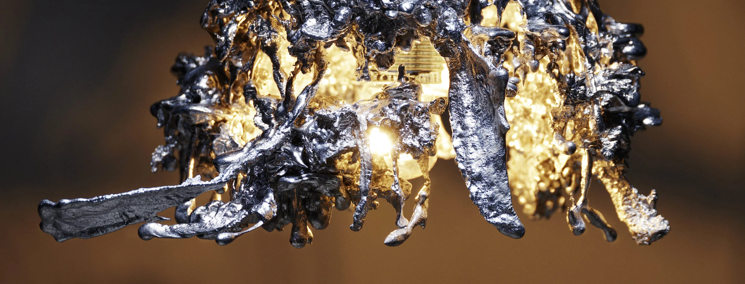 A closeup of the Tin Pendent Light by Michiel Poelmann
