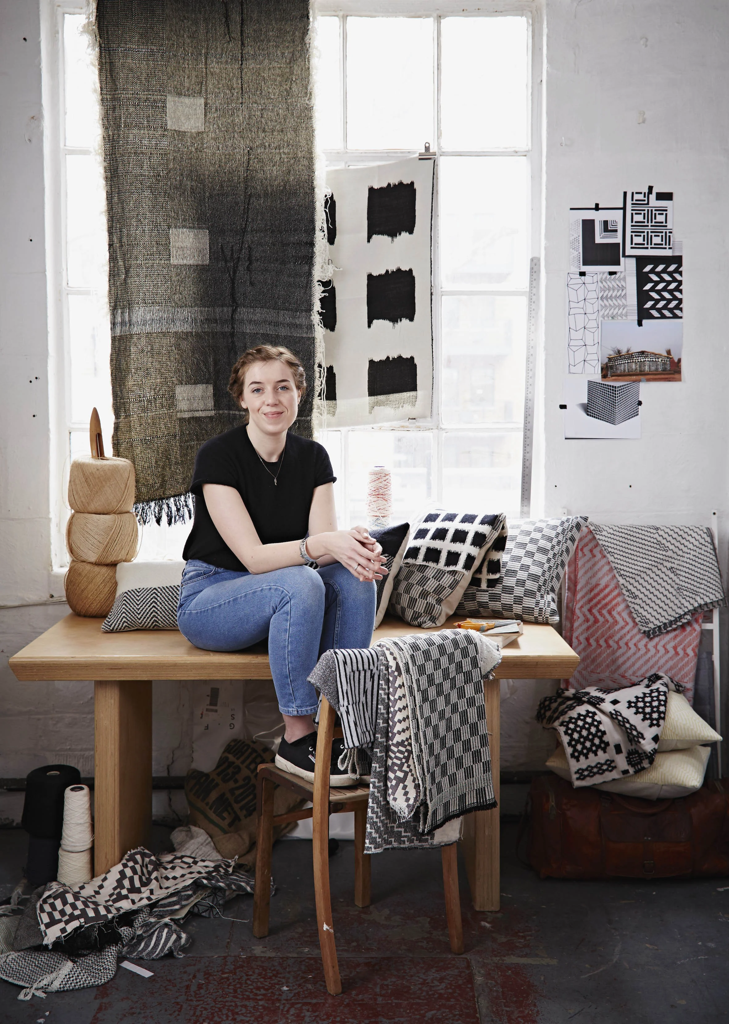 Beatrice in her London Studio, surrounded by woven textiles, including the recent 'Monochrome series', designed and developed by her