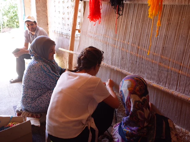 Sabrina, working with Moroccan weavers.