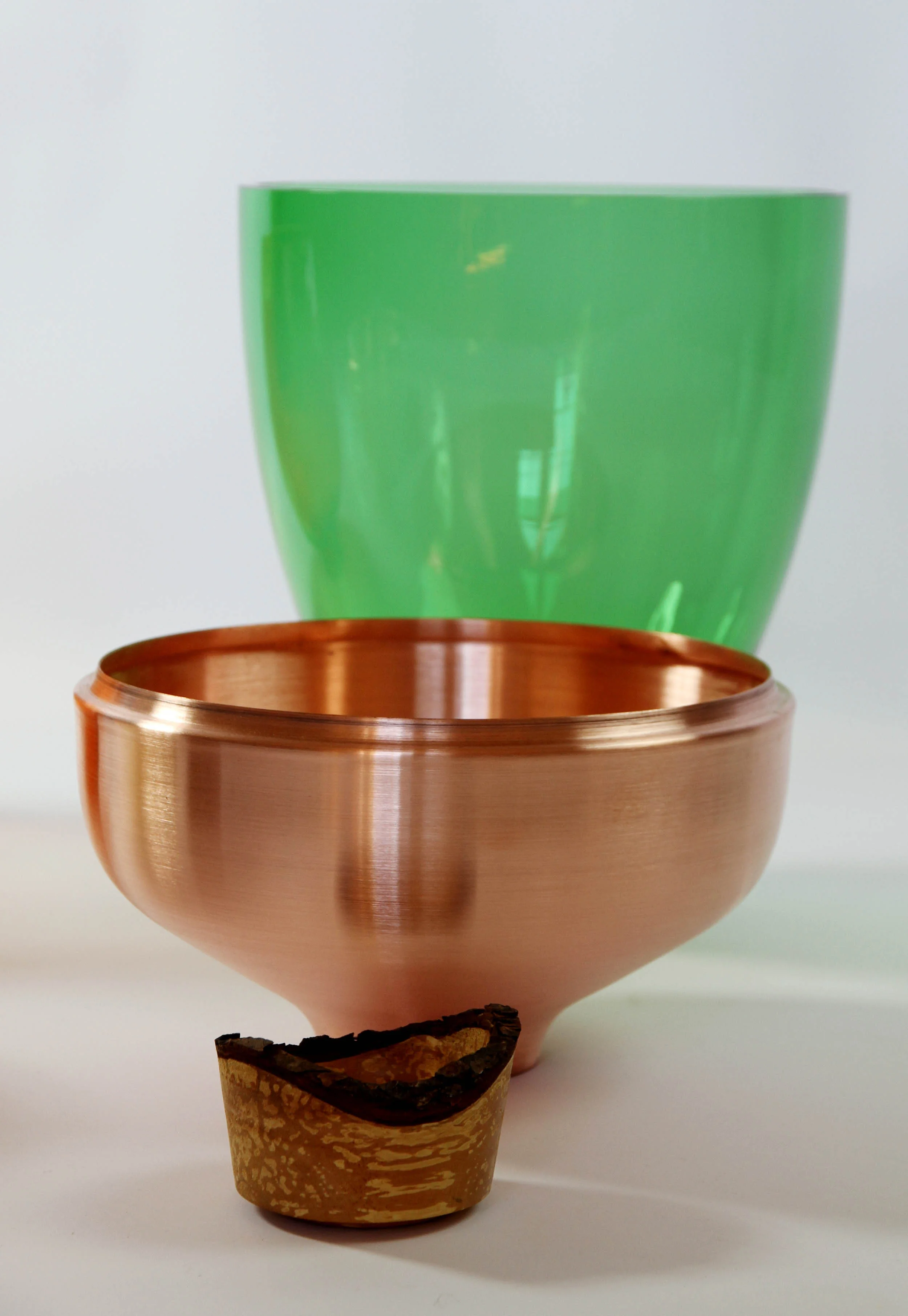 Stacking Vessels–vase-shaped composite arrangments of three contrastive containers, which can exist and be used individually