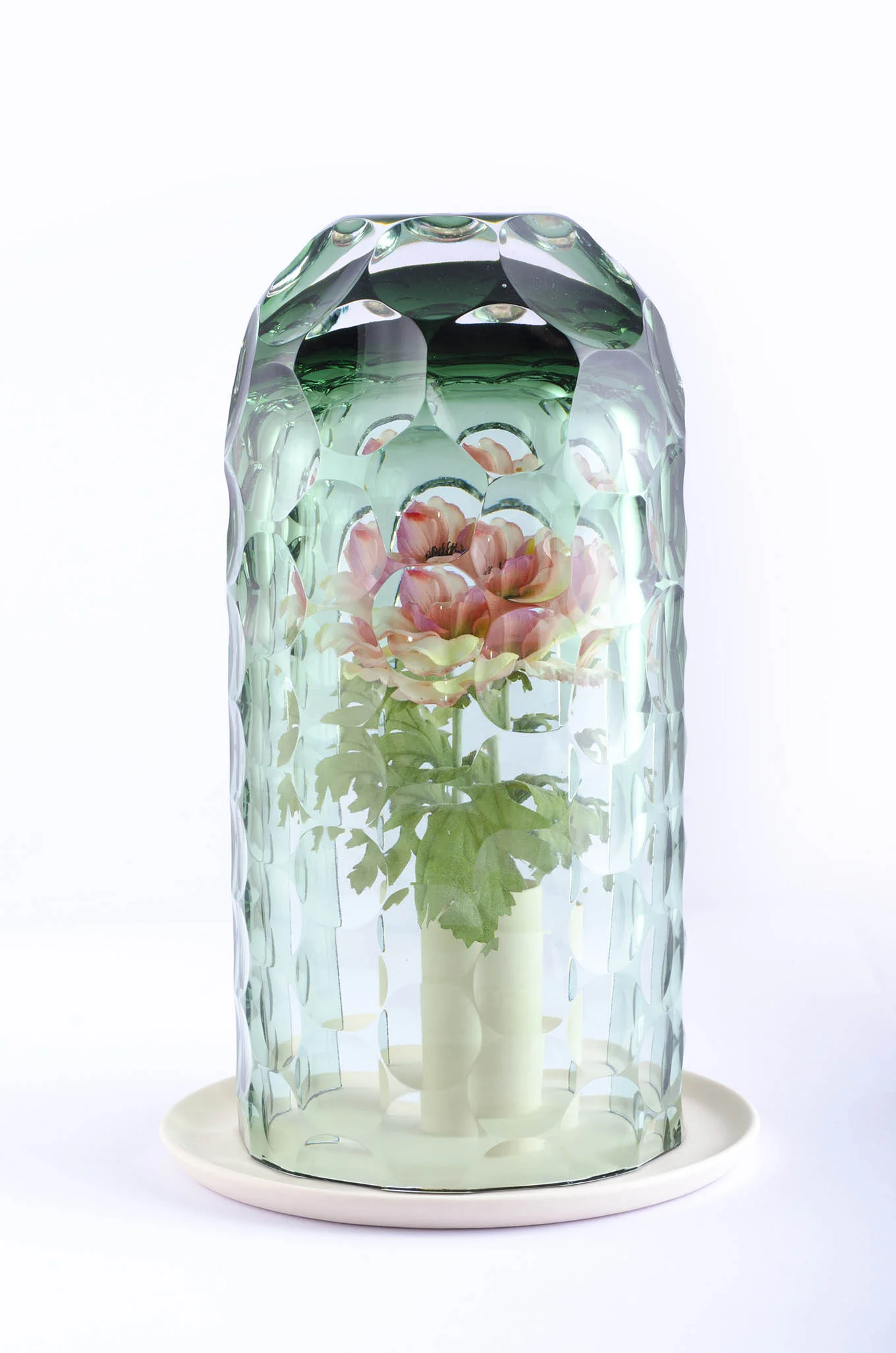 OP-Vase by Bilge Nur Saltik, creates a kaleidoscopic effect with its unique technique of cutting glass, a timeless material.
