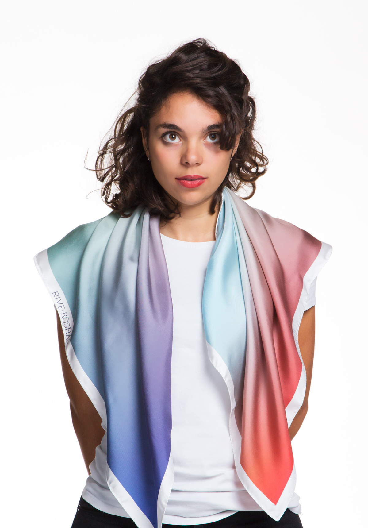 A fascination for fabric and colors is apparent in Rive Roshan's Hues Collection. Seen here is a scarf from the Hues collection.