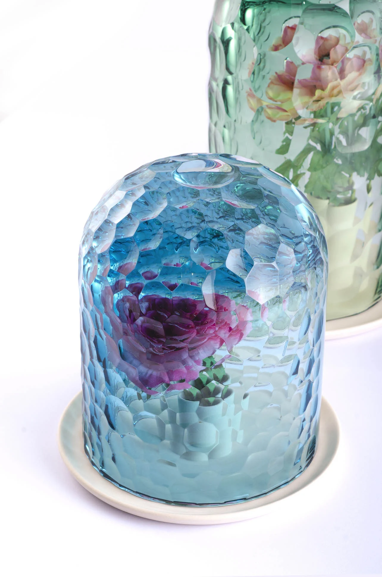 The OP-Vase collection by Bilge Nur Saltik, creates a kaleidoscopic effect with its unique technique of cutting glass, a timeless material.