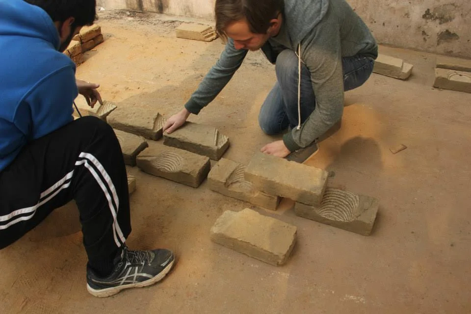 makeLab™''s students create a mockup of a wall, using digitally-milled bricks.