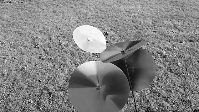 The metal flowers of Jessica Bizzoni's 'Rain Flower Walk'–a site-specific installation for Veenhuizen, The Netherlands