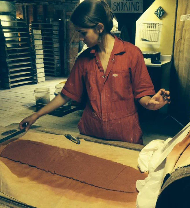 Patricia, seen here working with raw clay.
