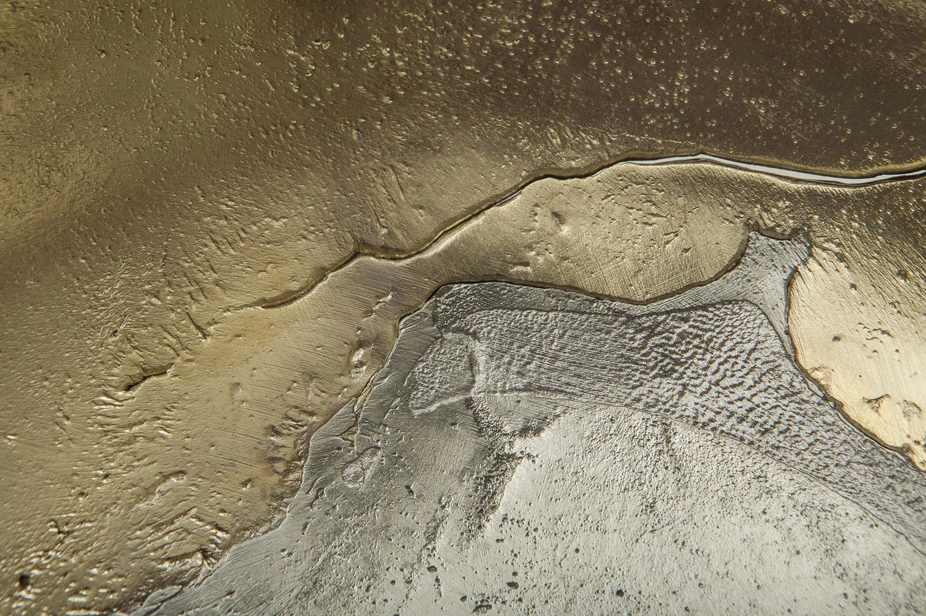 Dual Bowls by Kawther Al Saffar, celebrates the gruff and rudimentary casting techniques at Alwafi Foundry