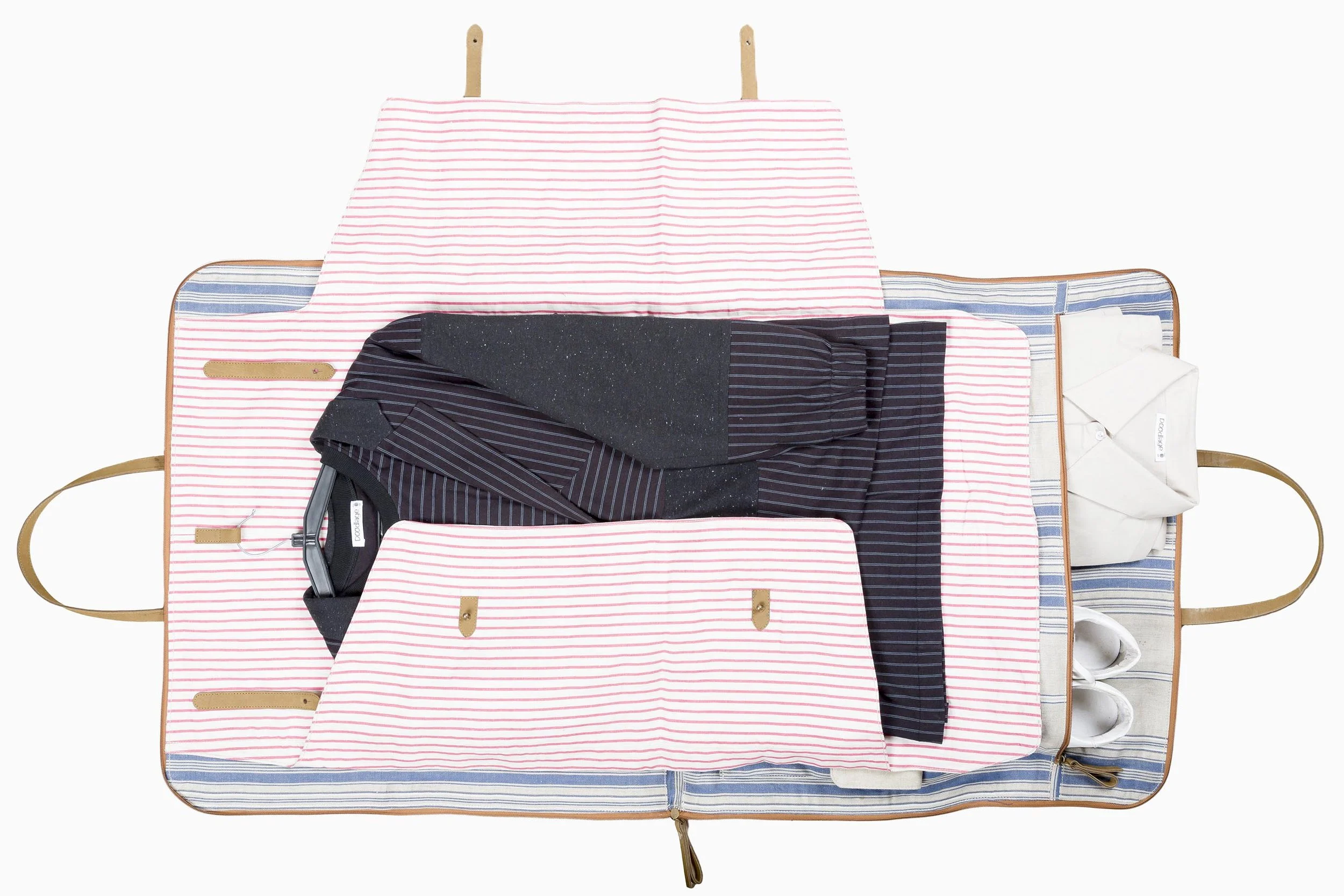 Disparate fabric pieces are quilted together to create robust and elegant pieces like this–A travel bag from Doodlage's new accessories collection.