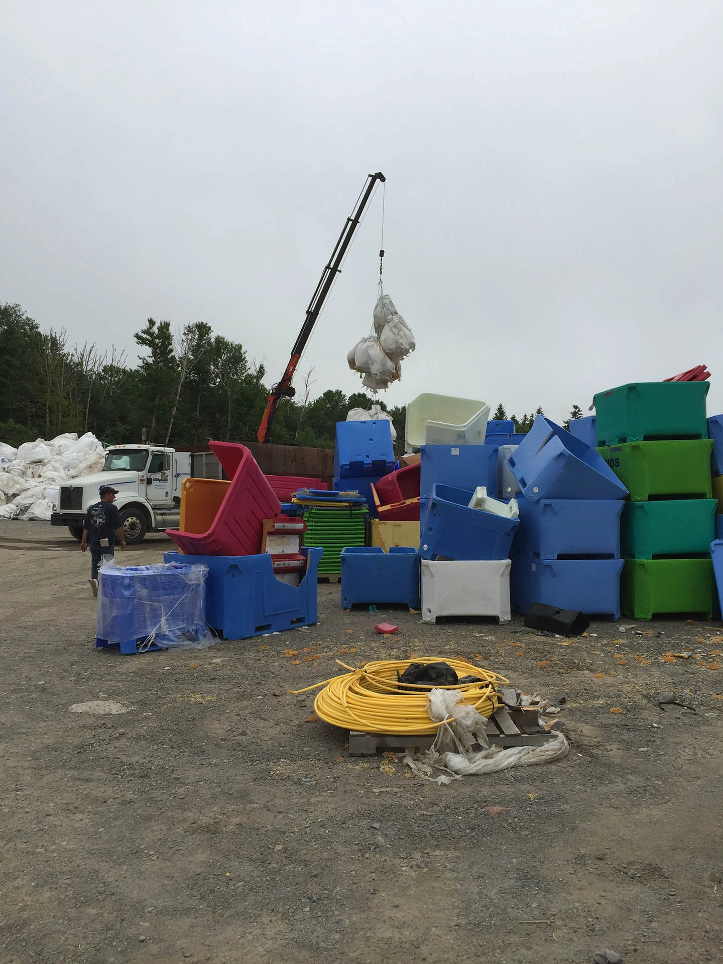 Damaged, discarded plastic crates that become the raw material for Aurora Robson's installation Dyno , seen below.