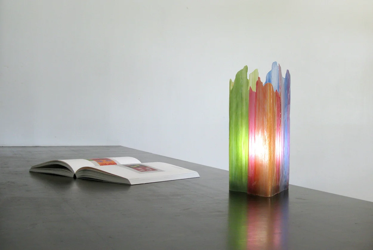 Painterly Spectrum Resin by Taeg Nishimoto is a table lamp made of epoxy resin cast on the surface of parchment paper, on which color strokes are applied beforehand using latex paint.