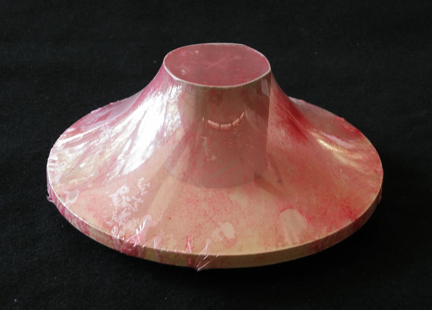 Above: The exploration process for the Nuclei Lamp by Taeg Nishimoto: Layers of shrink wrap (polyolefin film) hold between them liquid paint, and carry textures impressed upon them, inspired by the technique of 'Frottage'. Below: An image of the film and color test for the Nuclei Lamp at a small scale.