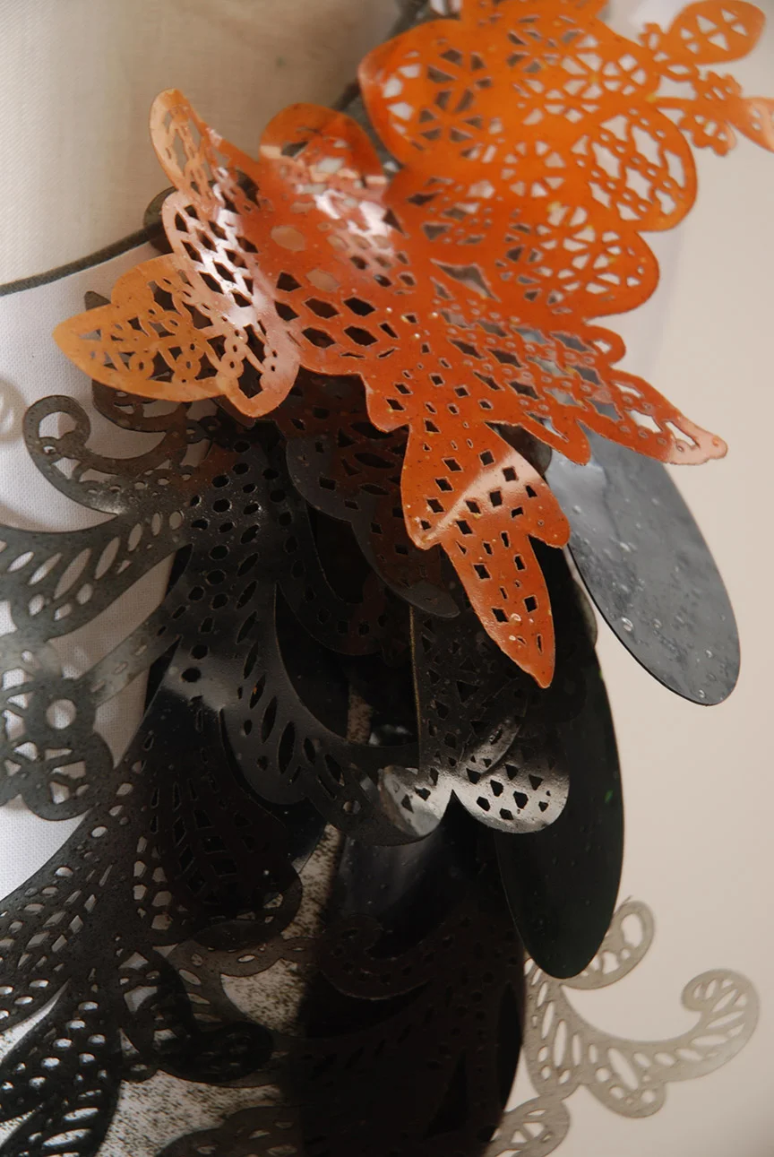 Intricate bioplastic sequins by The Sustainable Sequin Company.