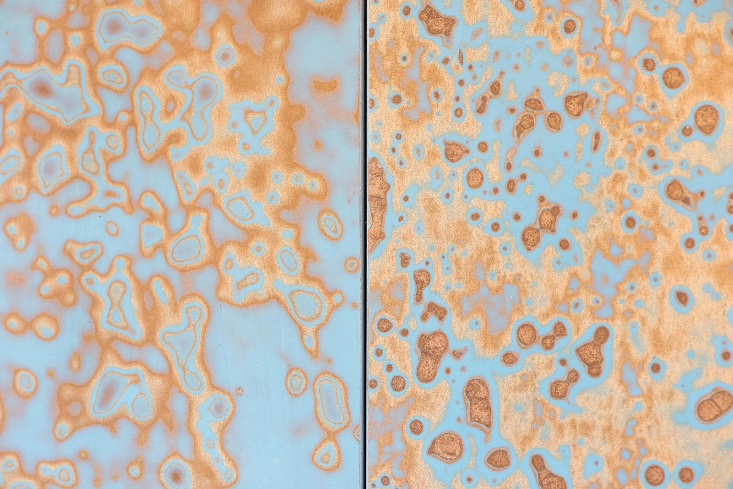 A bespoke Mirrl material with teal and copper colorways create for the Glasgow Housing Association