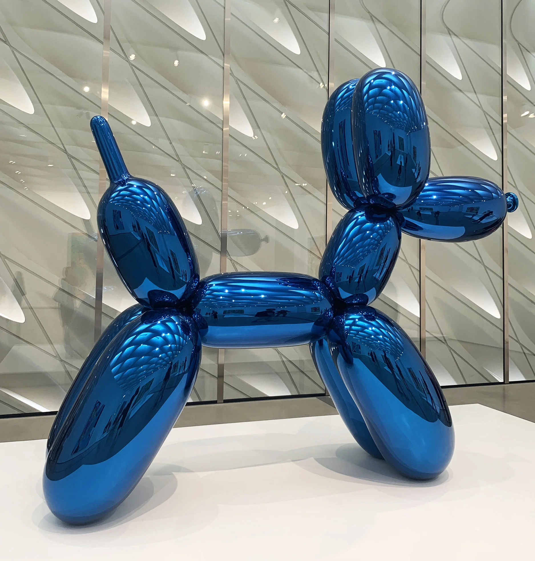 Balloon Dog (Blue) by Jeff Koons, Mirror-polish stainless steel, The Broad, Los Angeles. Photography courtesy MaterialDriven.