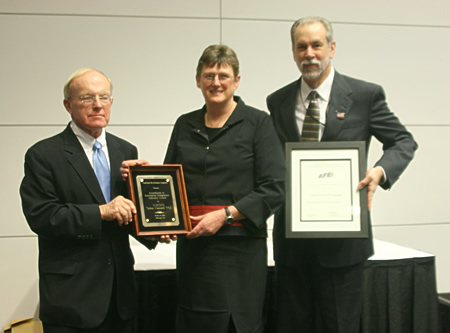 NAVSYS Wins AFEI's 2008 Excellence in Enterprise Integration Award for the Talon NAMATH Program The Association for Enterprise Integration (AFEI) awarded the 2008 Excellence in Enterprise Integration Award (Industry Top Award) to NAVSYS Corporation for its development of the Talon NAMATH Program. The award was presented at the DoD Open Technologies Conference on October 29, 2008, in Washington, D.C. Pictured above at the award ceremony are (l to r) John Garing, CIO & Chief Strategy Officer, DISA; Alison Brown, President & CEO, NAVSYS Corporation; Kelly Brown, CEO, EM Solutions and Chair, AFEI Board of Directors.