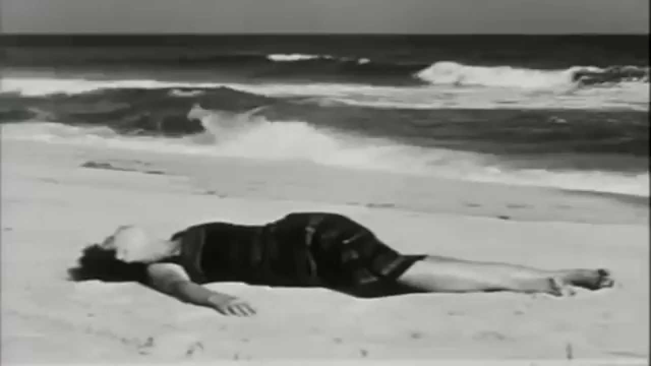 Maya Deren writes, directs, edits, and stars in the short film At Land