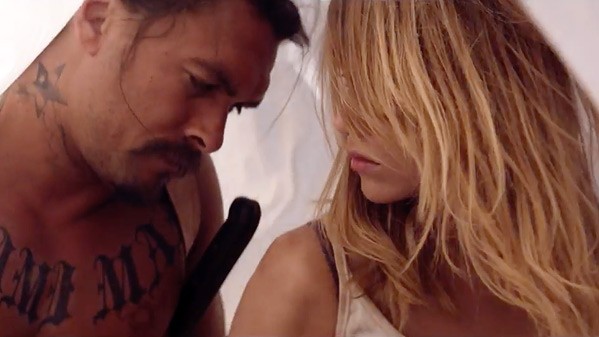 Miami Man (Jason Momoa) and Arlen (Suki Waterhouse) start to fall for each other in Ana Lily Amirpour's cannibal love story The Bad Batch.