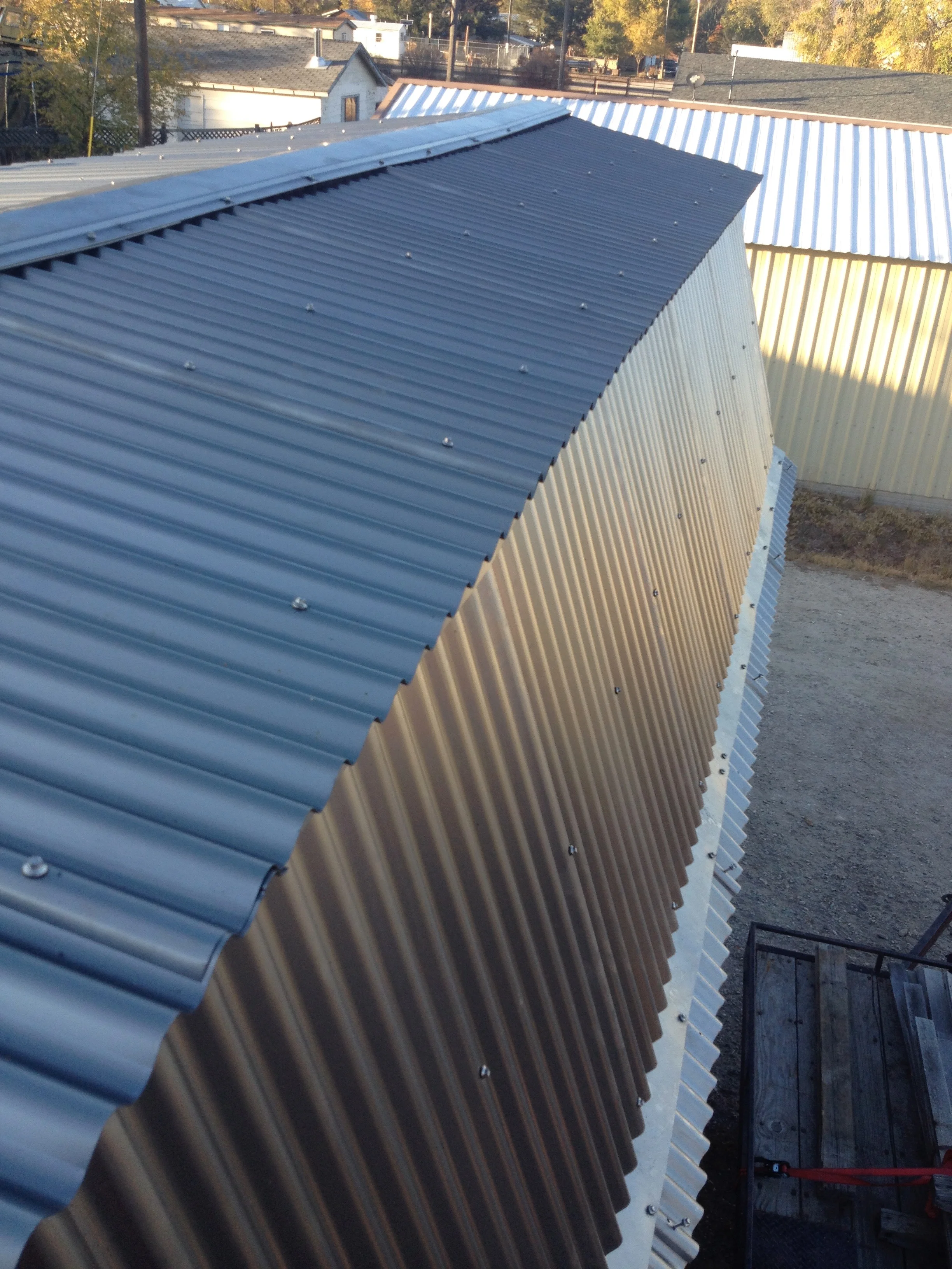 The coreten roof is a heavy duty hat for the house, and though it was a strenuous task to hang it, the beauty and protection are undeniable.