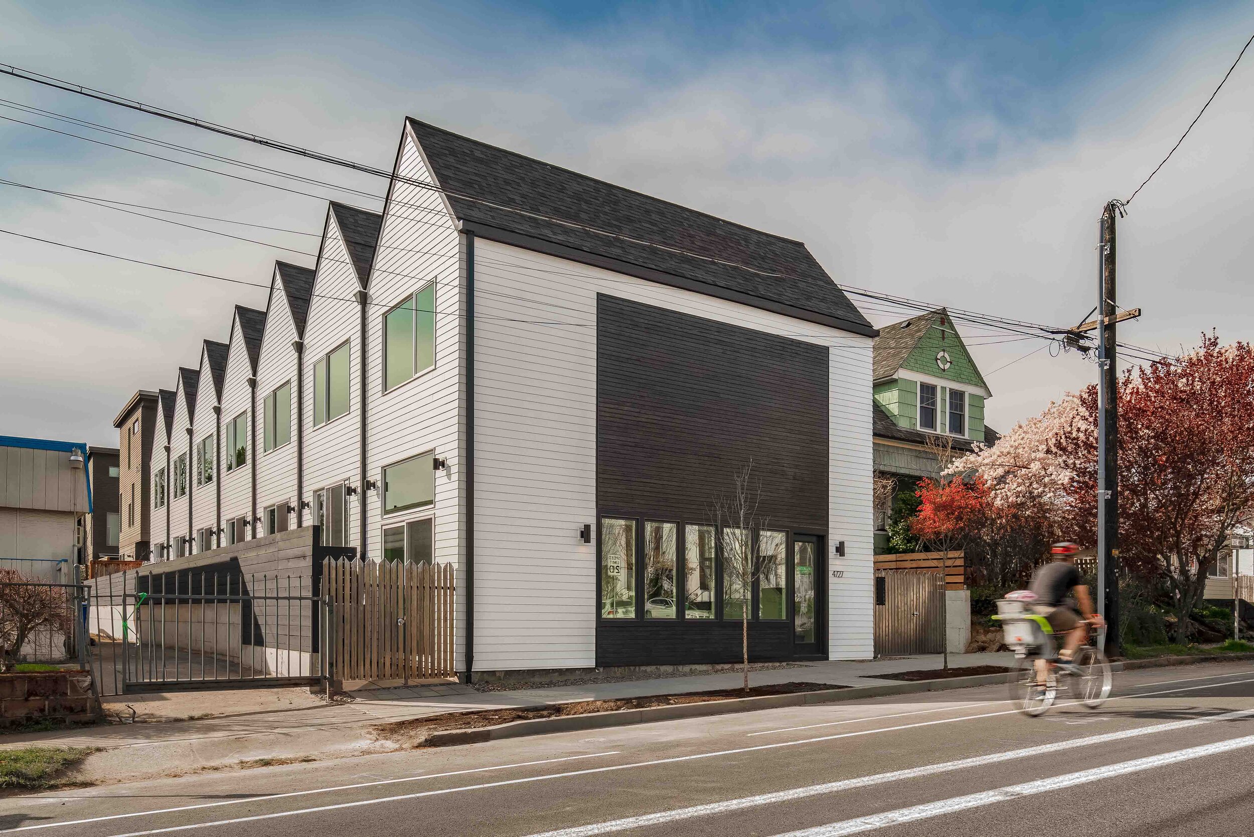  A custom designed townhouse multi-family community located on Williams Avenue. Design by architect Propel Studio. 