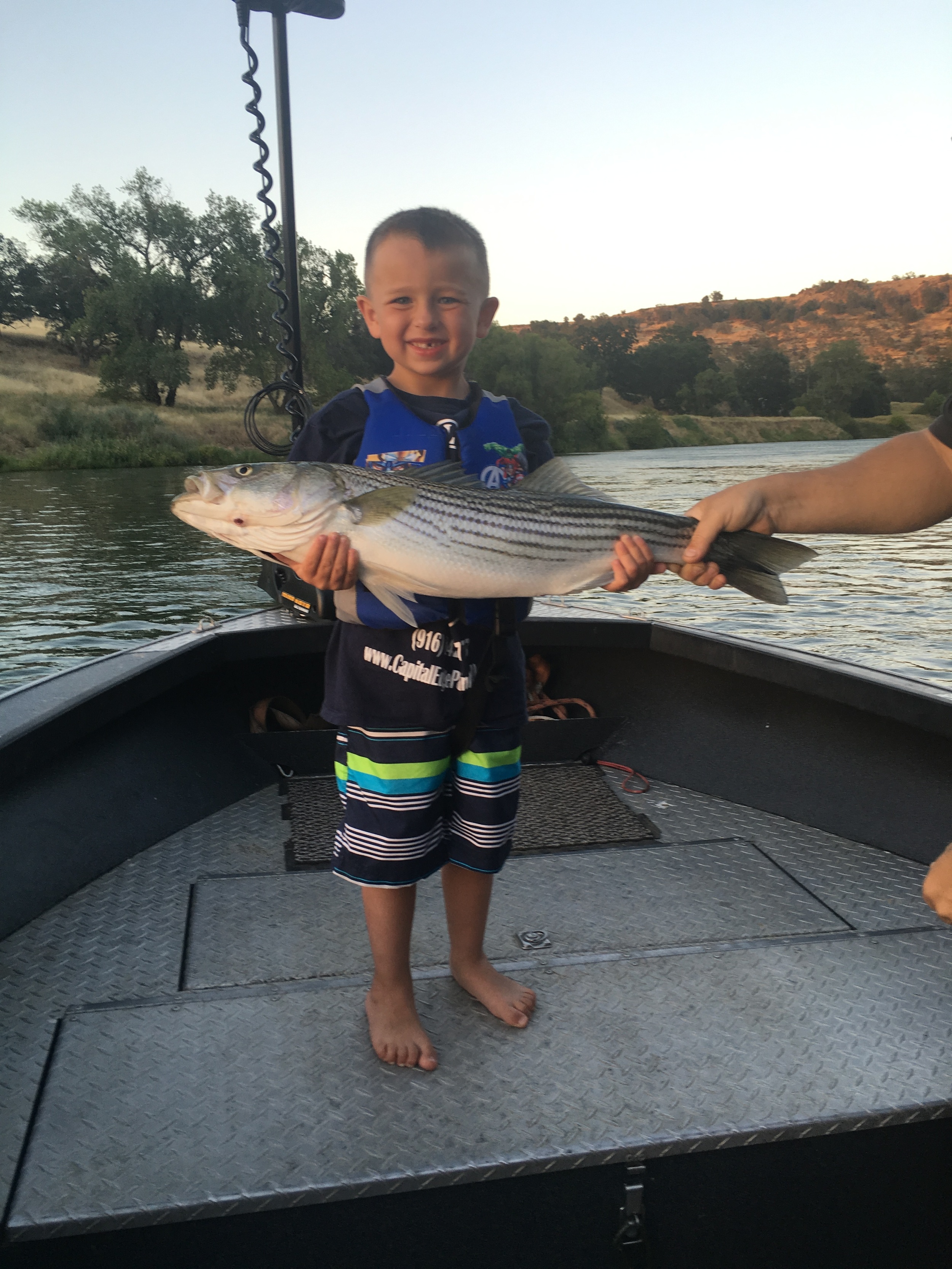 Kids love to fish with Mike Rasmussen of SalmonSacRiver.com