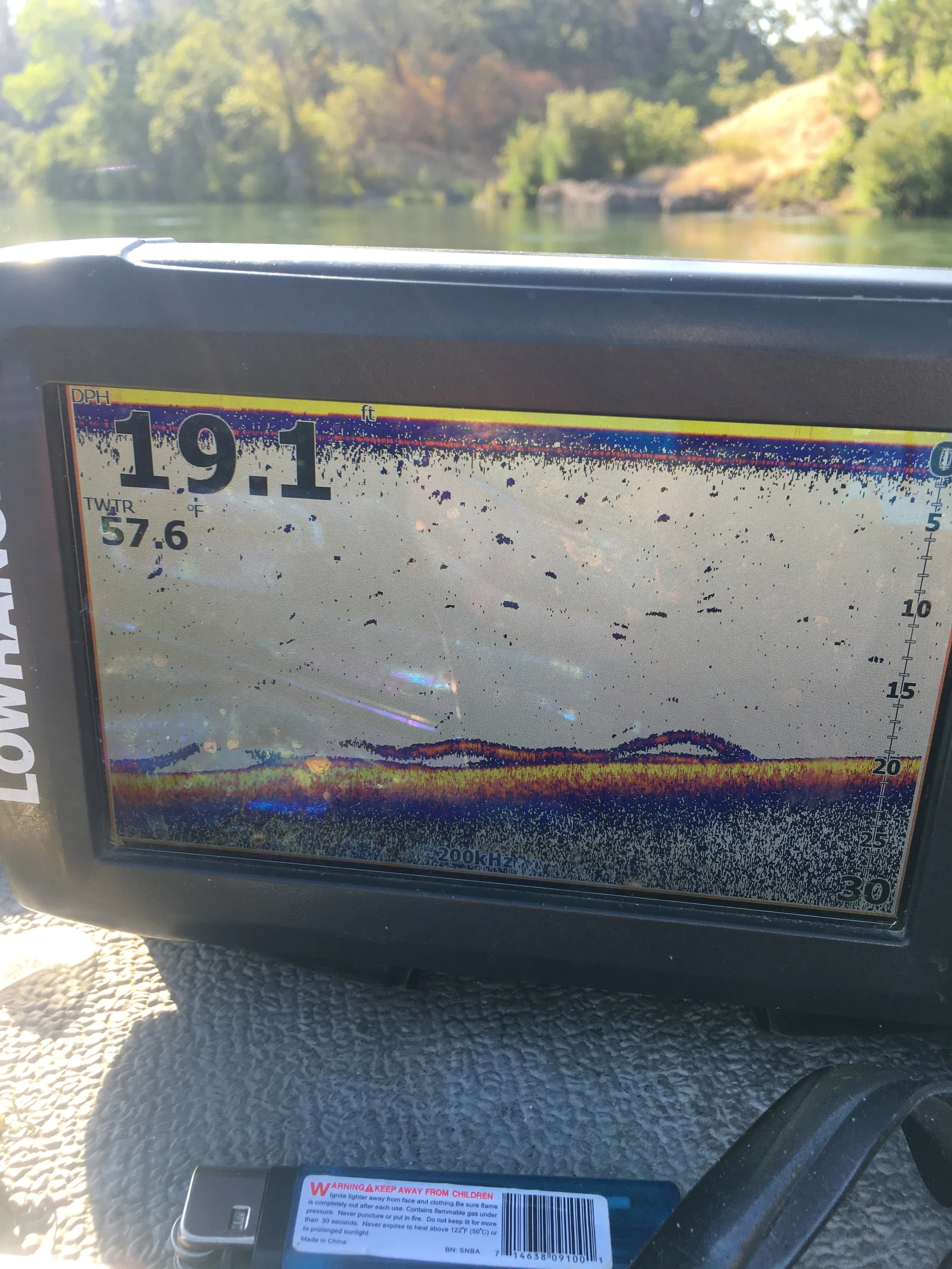Sacramento River fishing guide Mike Rasmussen shows green sturgeon on his fish finder