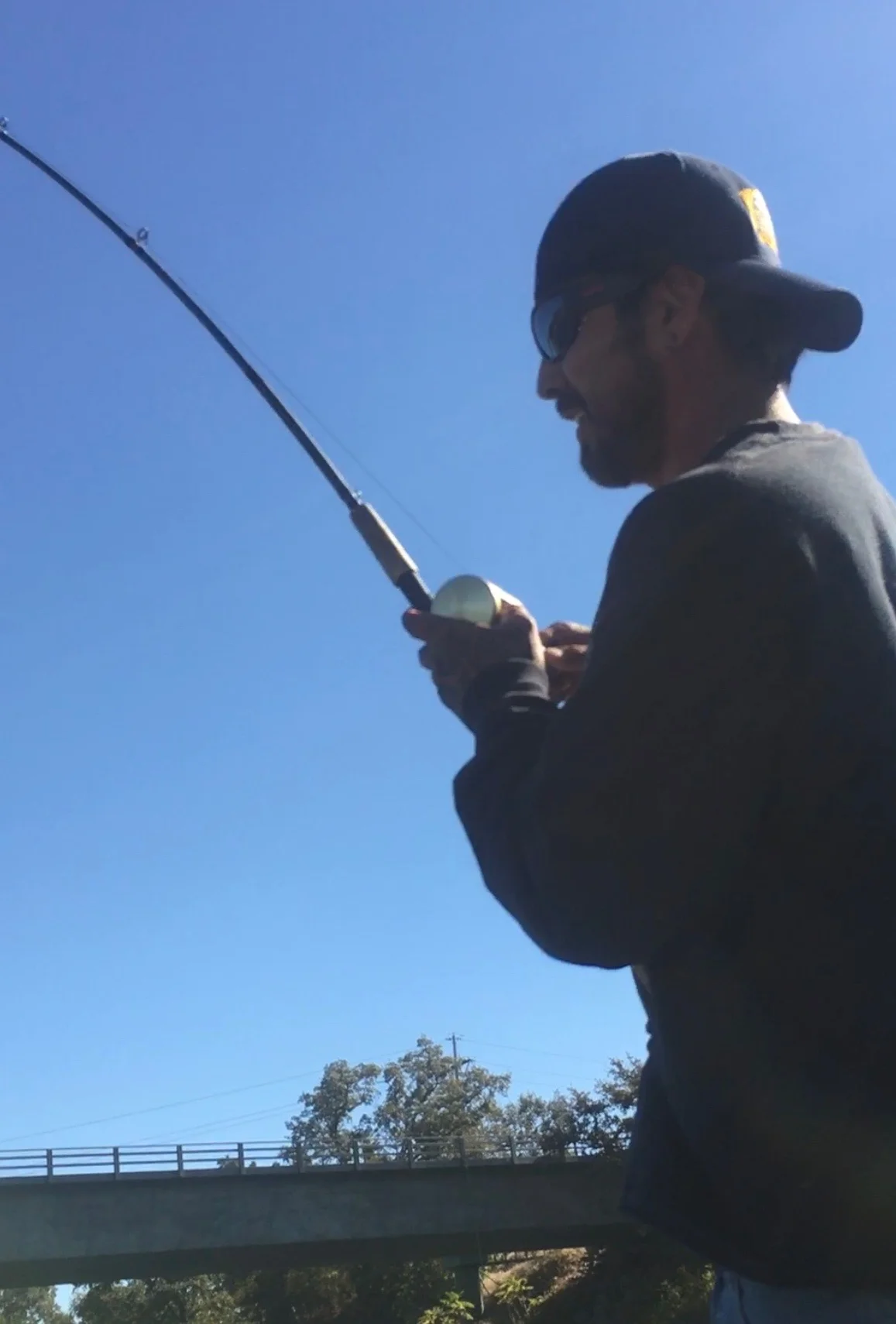 Juan Nava Fights A Sacramento River Salmon At The Boat Luanch