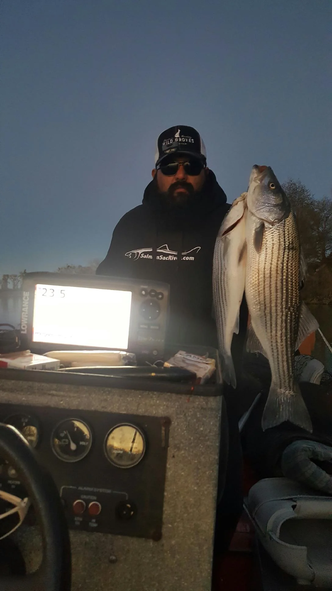 Oscar Nerey, a Northern California olive farmer holds up his limit of striped bass he caught with Sacramento River Striped Bass Fishing Guide Mike Rasmussen of SalmonSacRiver.com&nbsp;on December 29, 2016.Mike's Fishing Guide &amp; Charter Service F…