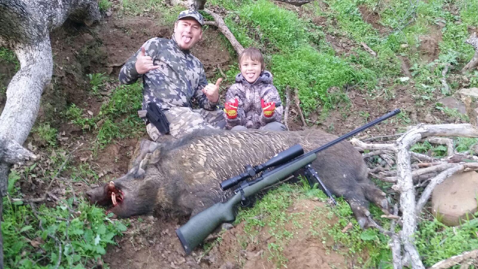 Michael Armstrong With A Hog He Shot On A Northern California Ranch