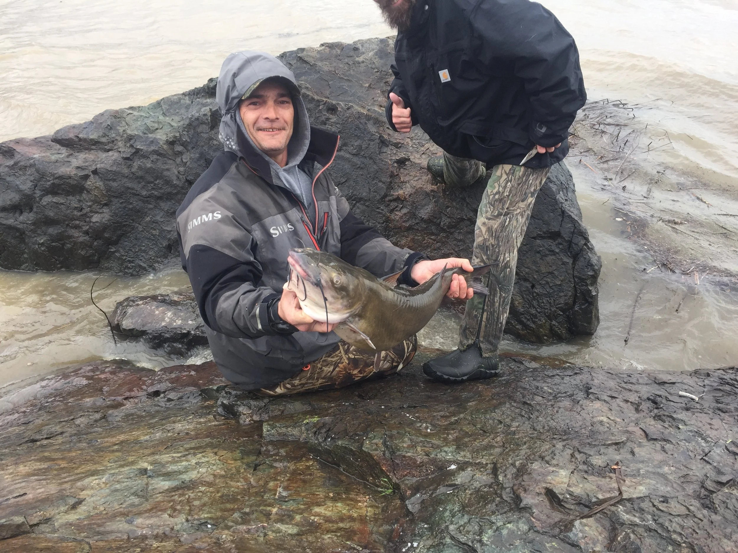 Gary Collins Hold A Big Clearlake Catfish With Fishing Guide John Pearl