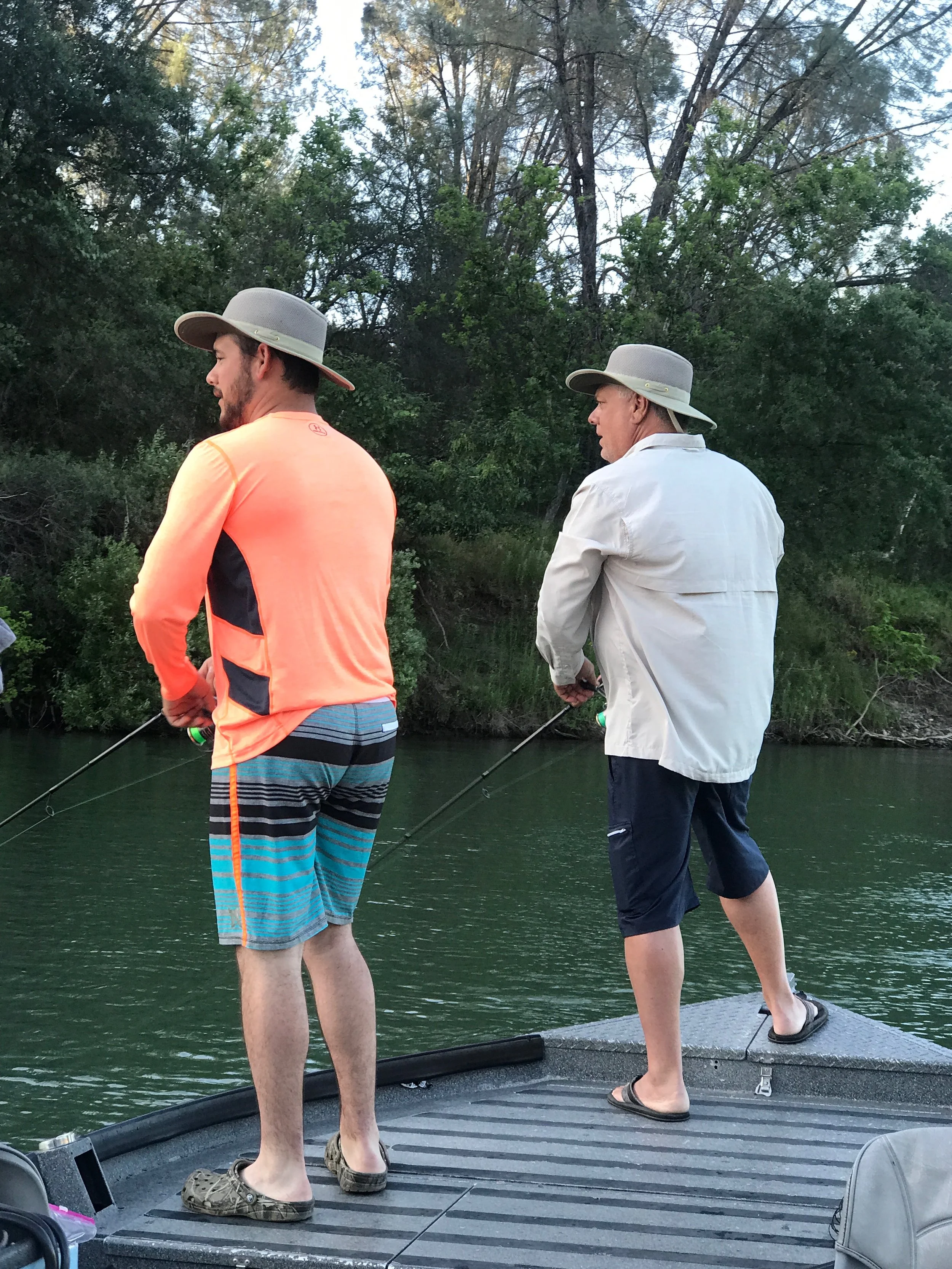 Father And Son Striped Bass Fishing On The Sacramento River