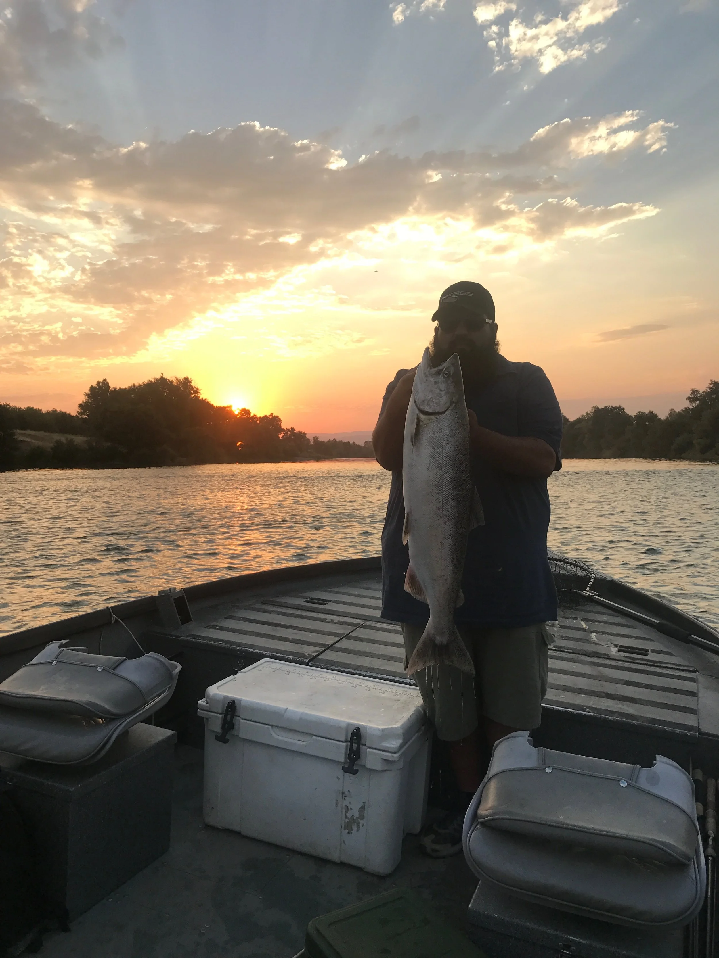 Oscar Nerey with a dime bright Feather River Salmon he caught on August 3, 2017 on the Feather River outside of Oroville, Ca using a K-16 kwikfish wrapped with sardine and crawdad tail. 